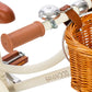 Children's bicycle with wicker basket and Banwood branding