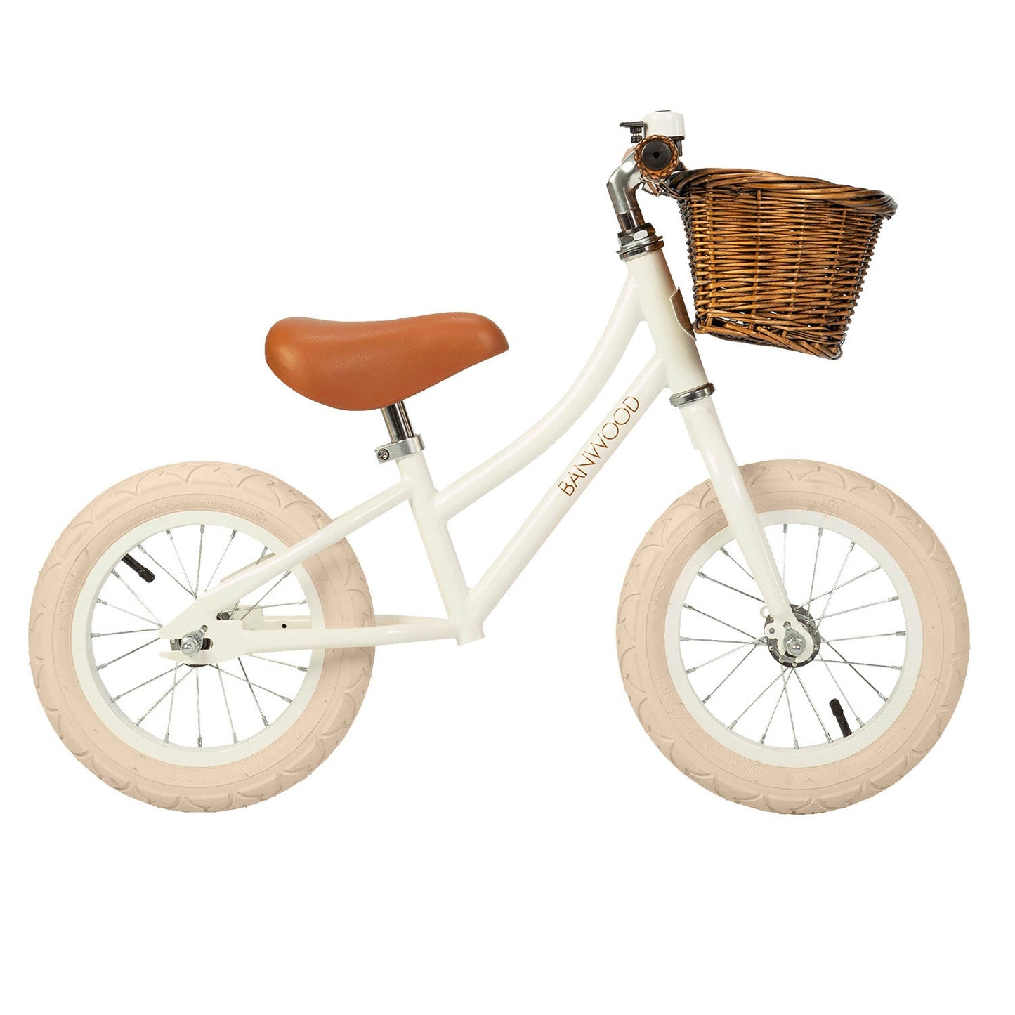 White children's bike with a brown basket and seat on a white background