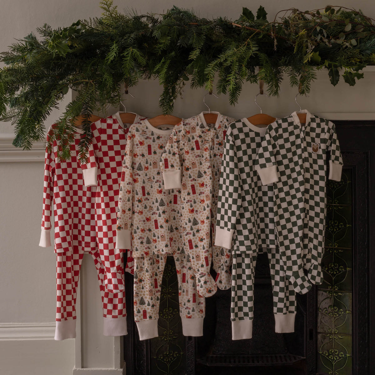 Avery Row Christmas Baby Jersey Sleepsuit - Red Checkerboard