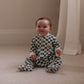 Avery Row Christmas Baby Jersey Sleepsuit - Green Checkerboard