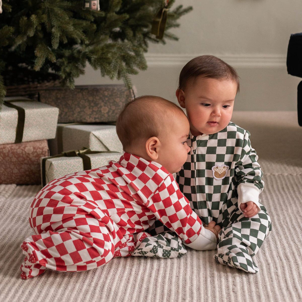 Avery Row Christmas Baby Jersey Sleepsuit - Green Checkerboard