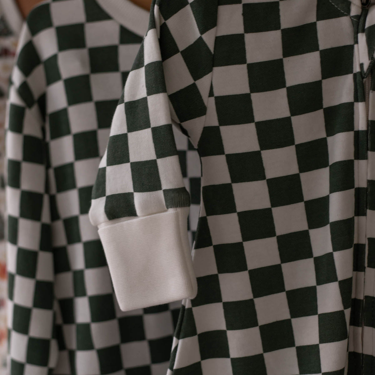 Avery Row Christmas Baby Jersey Sleepsuit - Green Checkerboard