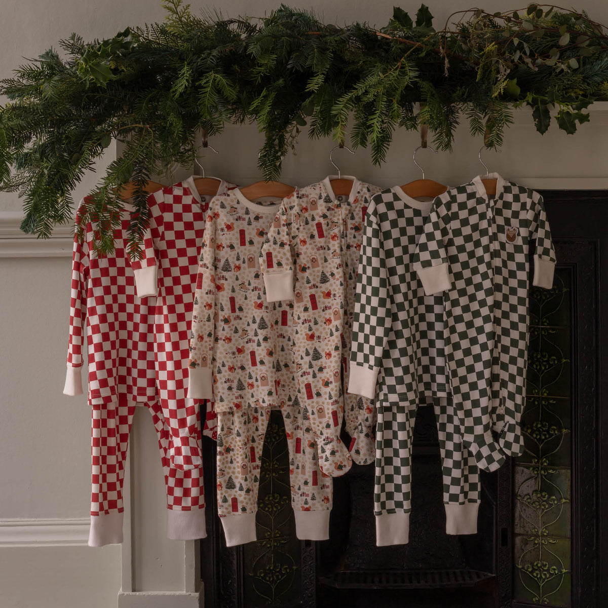 Avery Row Christmas Baby Jersey Sleepsuit - Green Checkerboard