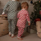 Avery Row Children's Jersey Pyjamas - Red Checkerboard