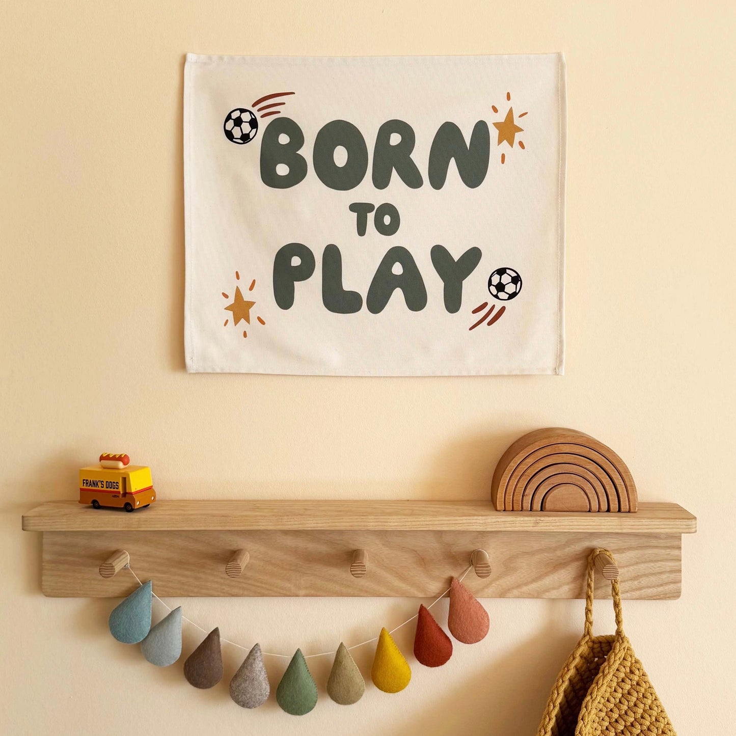 Kid of the Village Born to Play Wall Banner