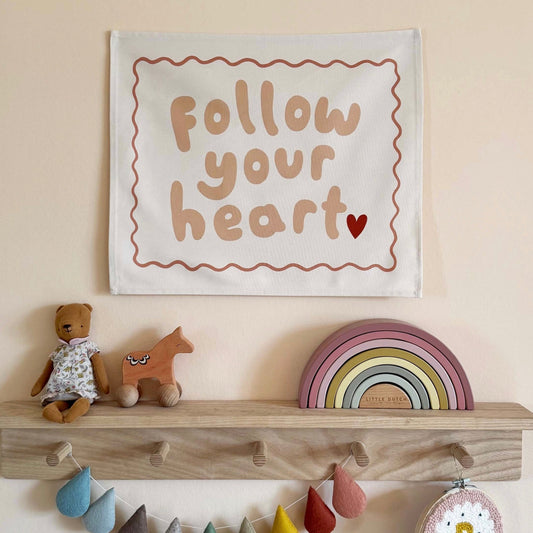 Kid of the Village Follow Your Heart Wall Banner