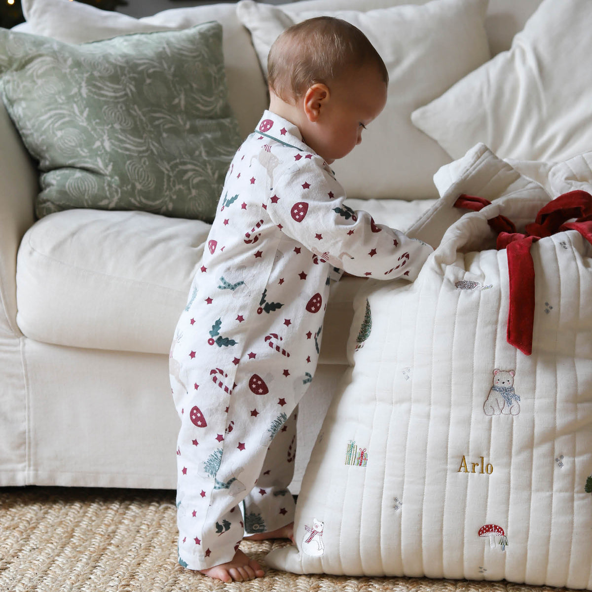 Avery Row Baby Flannel Sleepsuit - Christmas Carousel