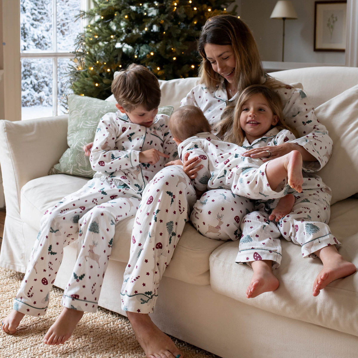 Avery Row Baby Flannel Sleepsuit - Christmas Carousel