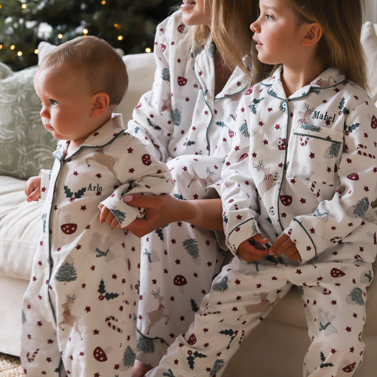 Avery Row Baby Flannel Sleepsuit - Christmas Carousel
