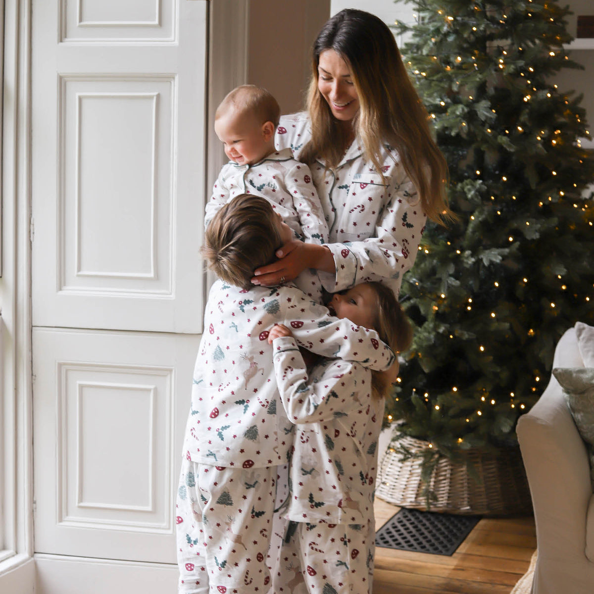 Avery Row Baby Flannel Sleepsuit - Christmas Carousel