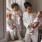 Avery Row Baby Flannel Sleepsuit - Holly Scatter