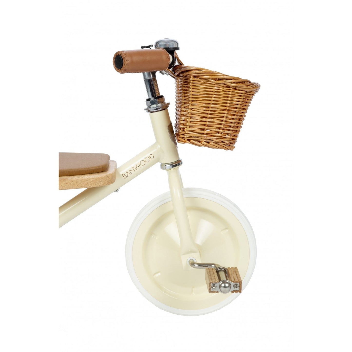 Children's balance bike with a wicker basket on a white background
