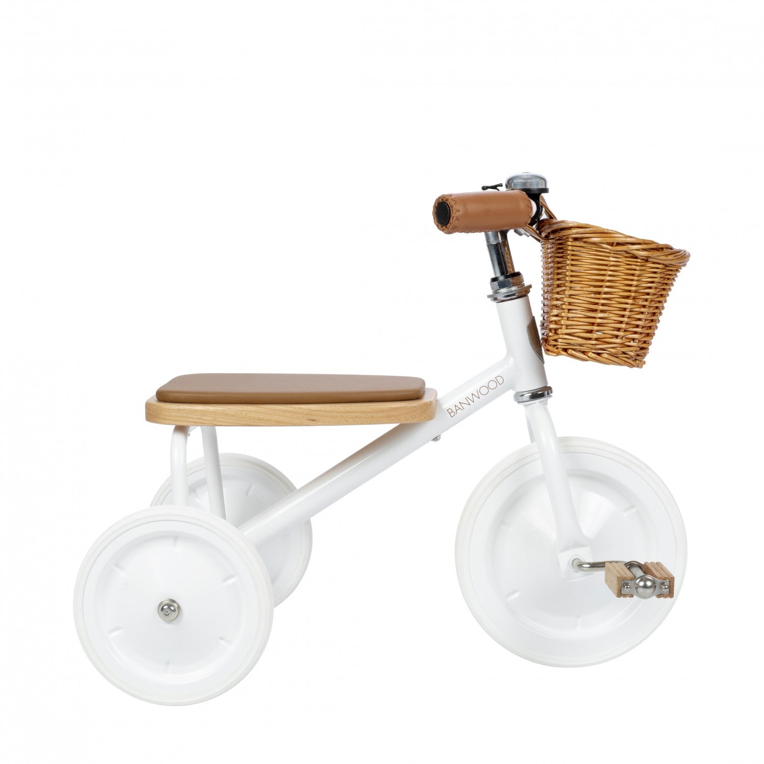 White children's tricycle with wooden seat and basket on a white background