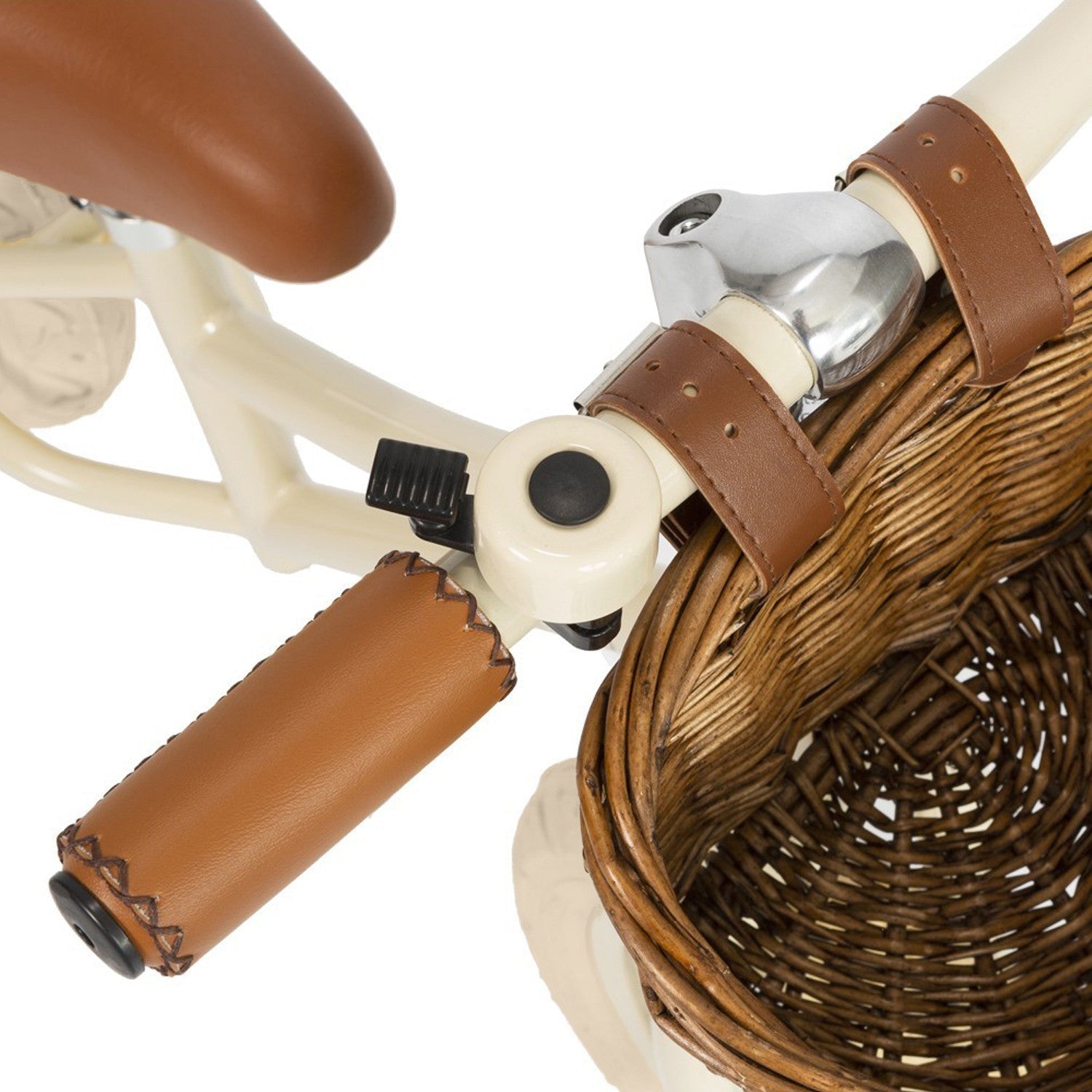 Close-up of a bicycle handlebar with brown grips and a wicker basket on a white background