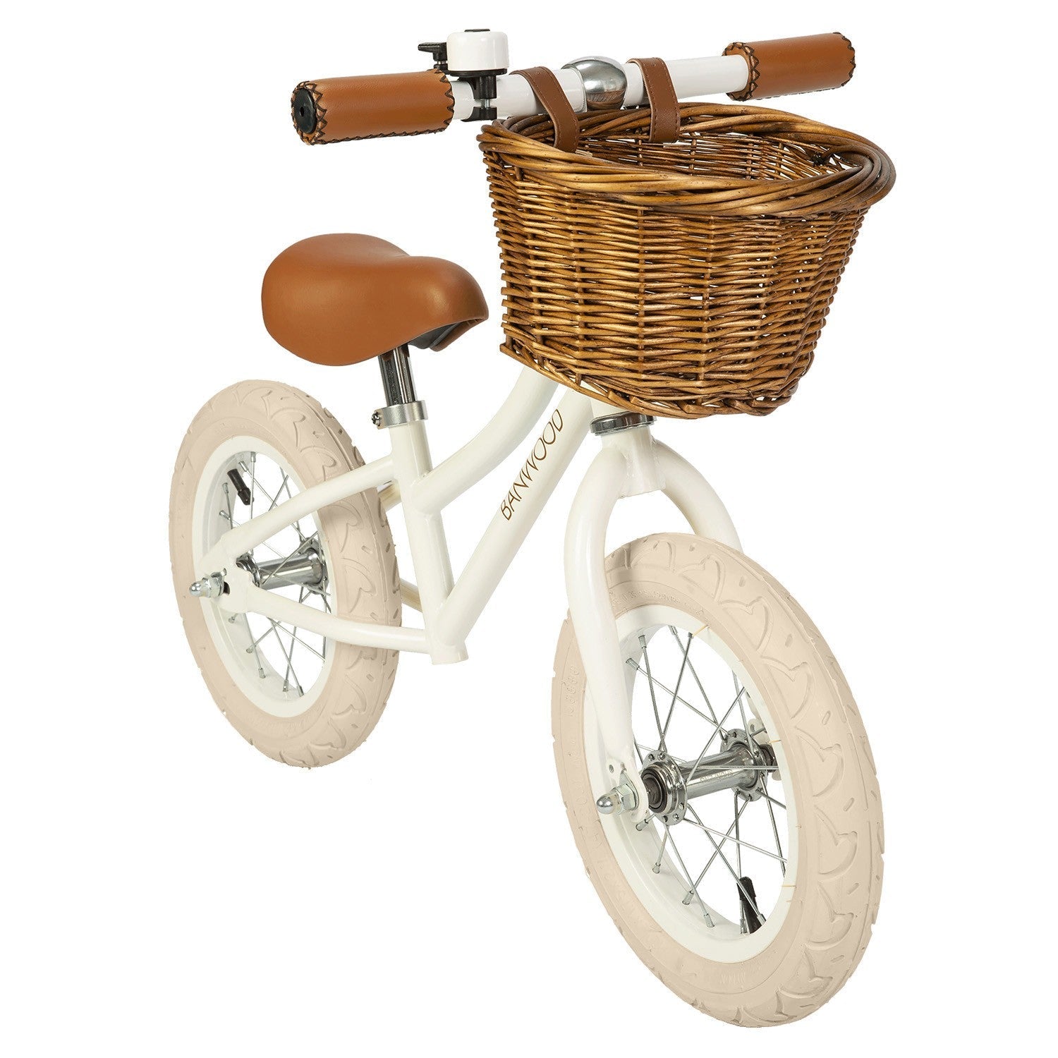 Children's balance bike with a wicker basket on a white background