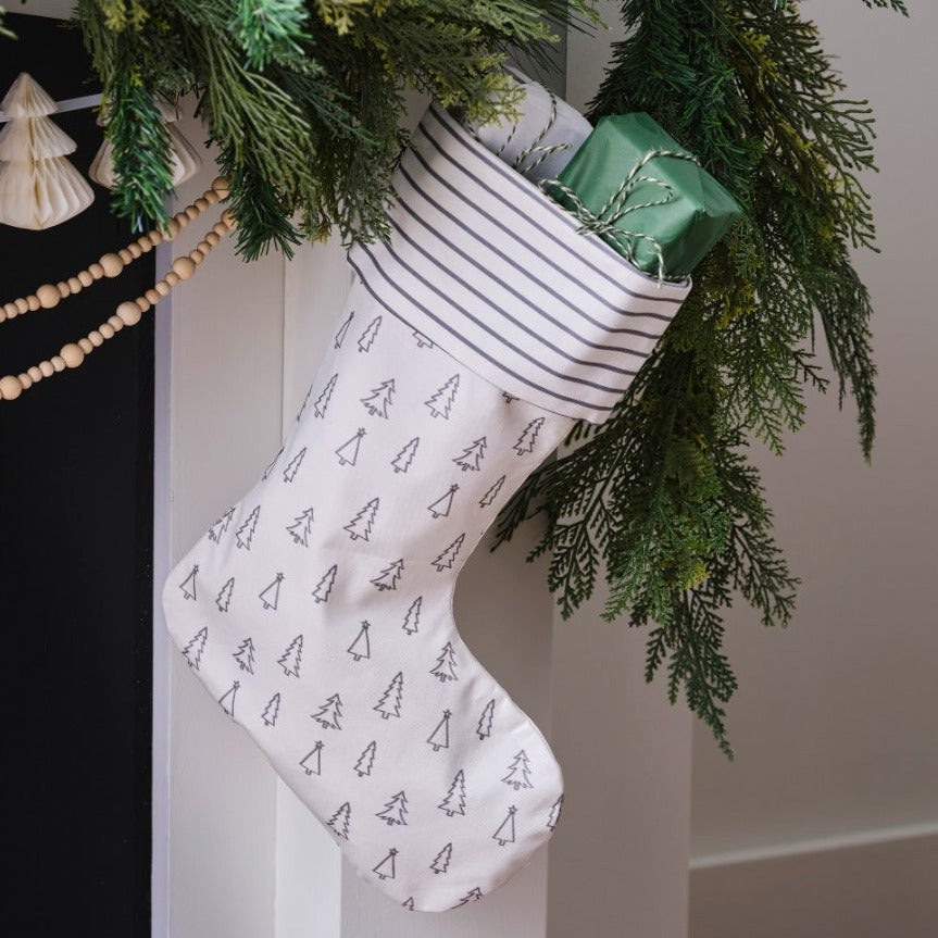 Christmas Stocking in Grey Tree & Stripe Print by Ginger Ray