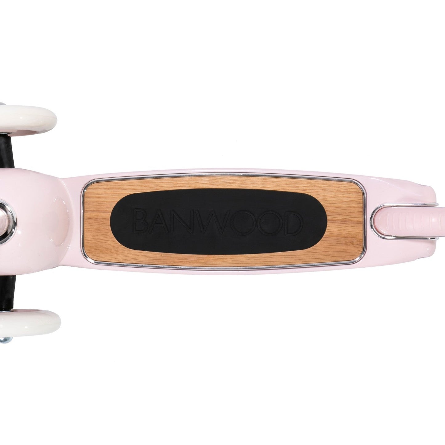 Close-up of a pink scooter with wooden label on a white background